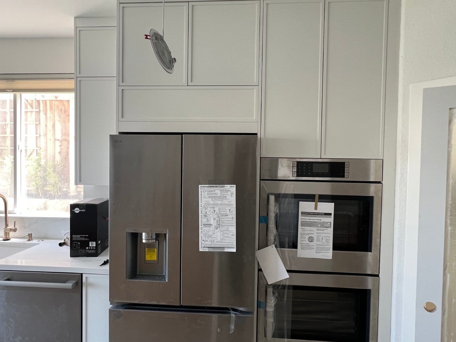 High-end white kitchen after a complete remodeling project