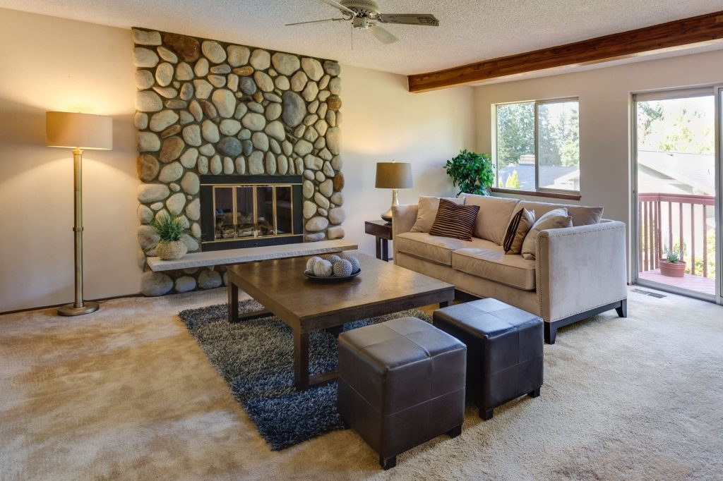 Classic Family Room with Build in Fireplace and 3 D Stone Wall Decor - Home Remodeling Moraga