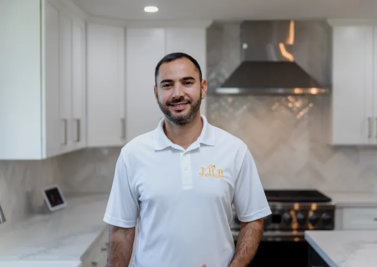 top home builder ceo smiling after completing a project in san jose